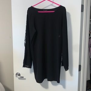 Black slip dress with lace sleeves